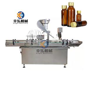 Máquina automática de llenado y taponado de viales de vidrio para productos biológicos